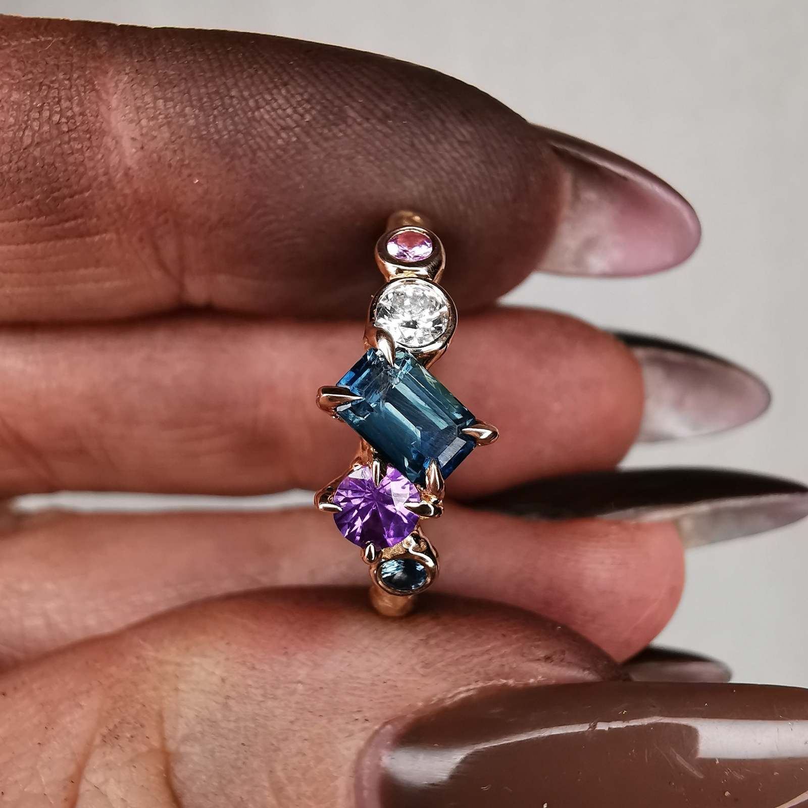 A Bouquet Of Flowers Rose Gold Ring With Sapphires