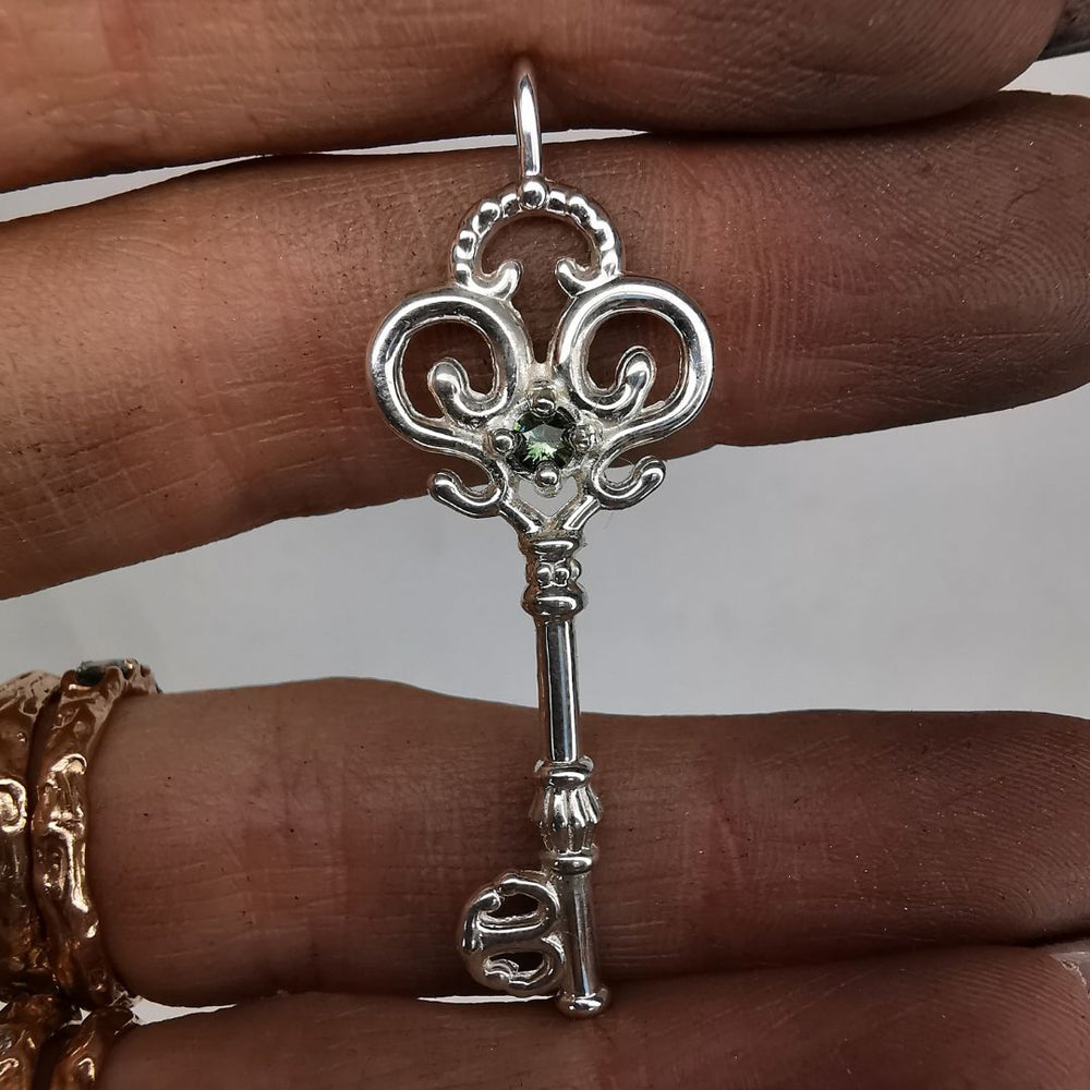 Silver Key Pendant With Sapphire