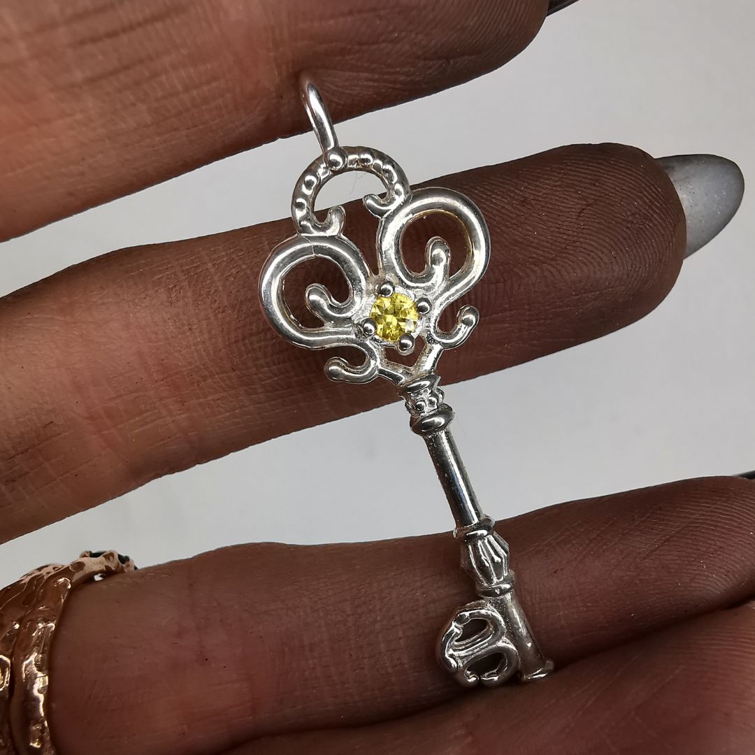 Silver Key Pendant With Sapphire