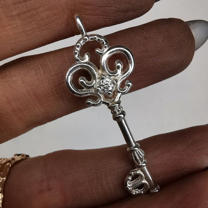Silver Key Pendant With Moissanite