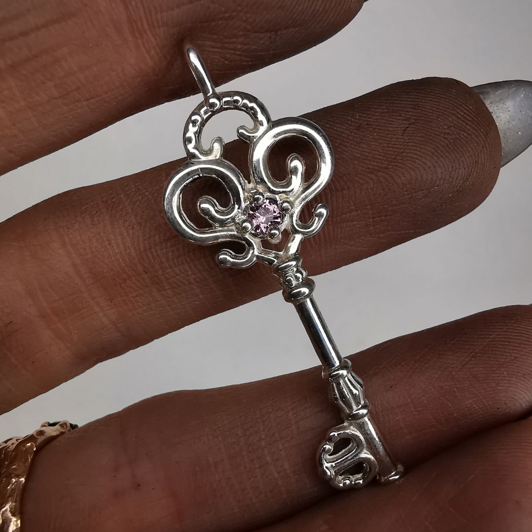Silver Key Pendant With Sapphire