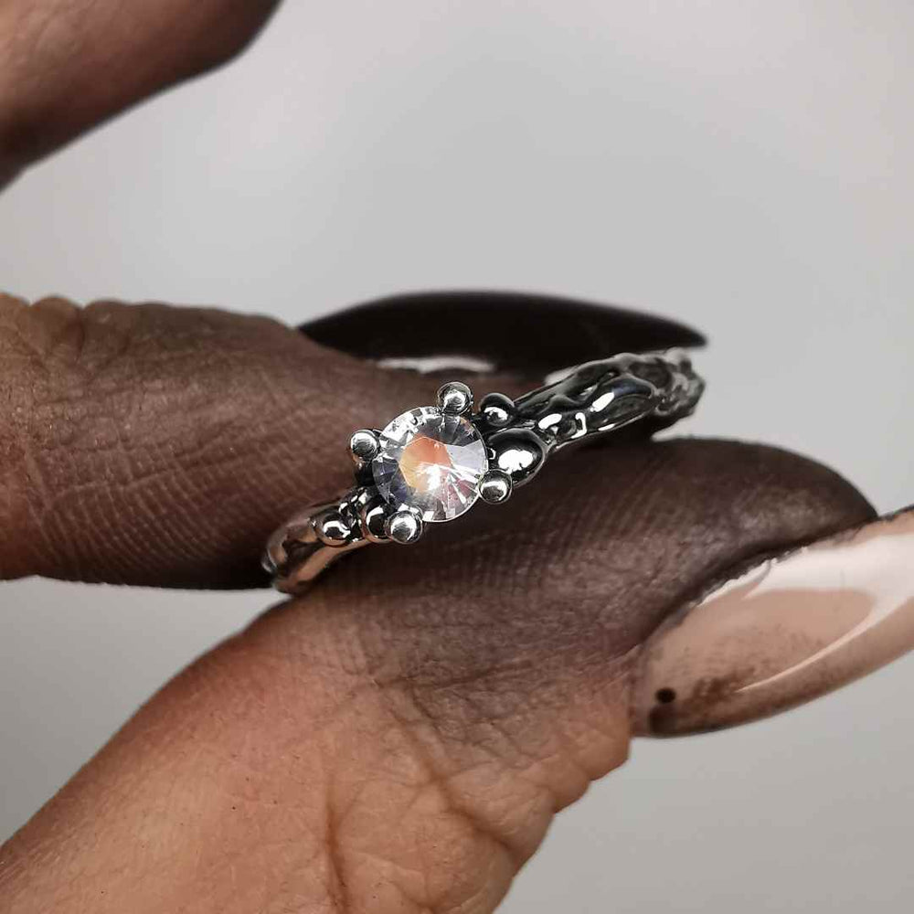Silver Ring " Splashes " With 4mm Moonstone